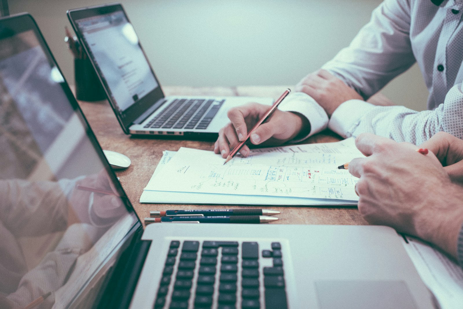 Business planning and reporting materials on a desk